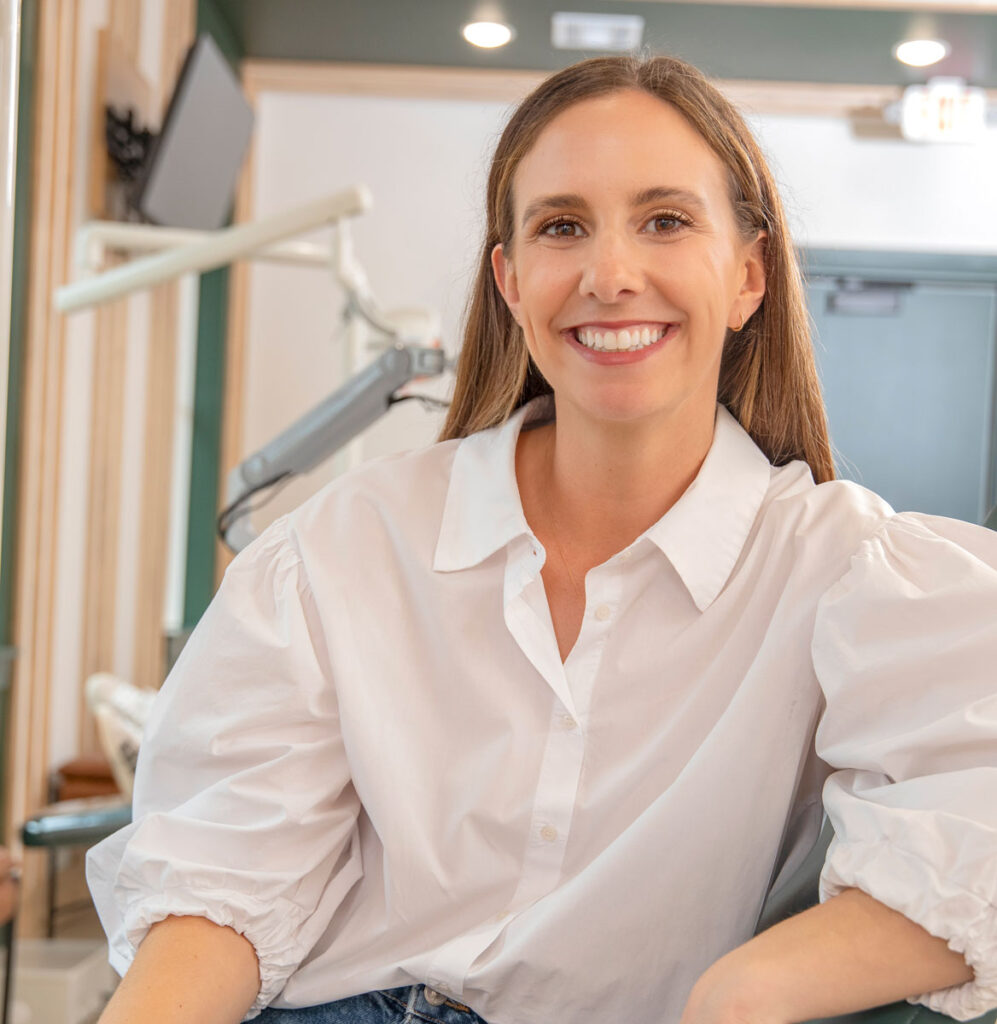 Adult smiling because of the Clubhouse orthodontist